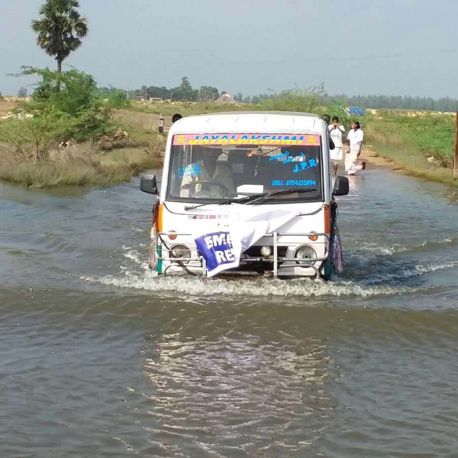 Mobile Medical Unit crossing a flooding street